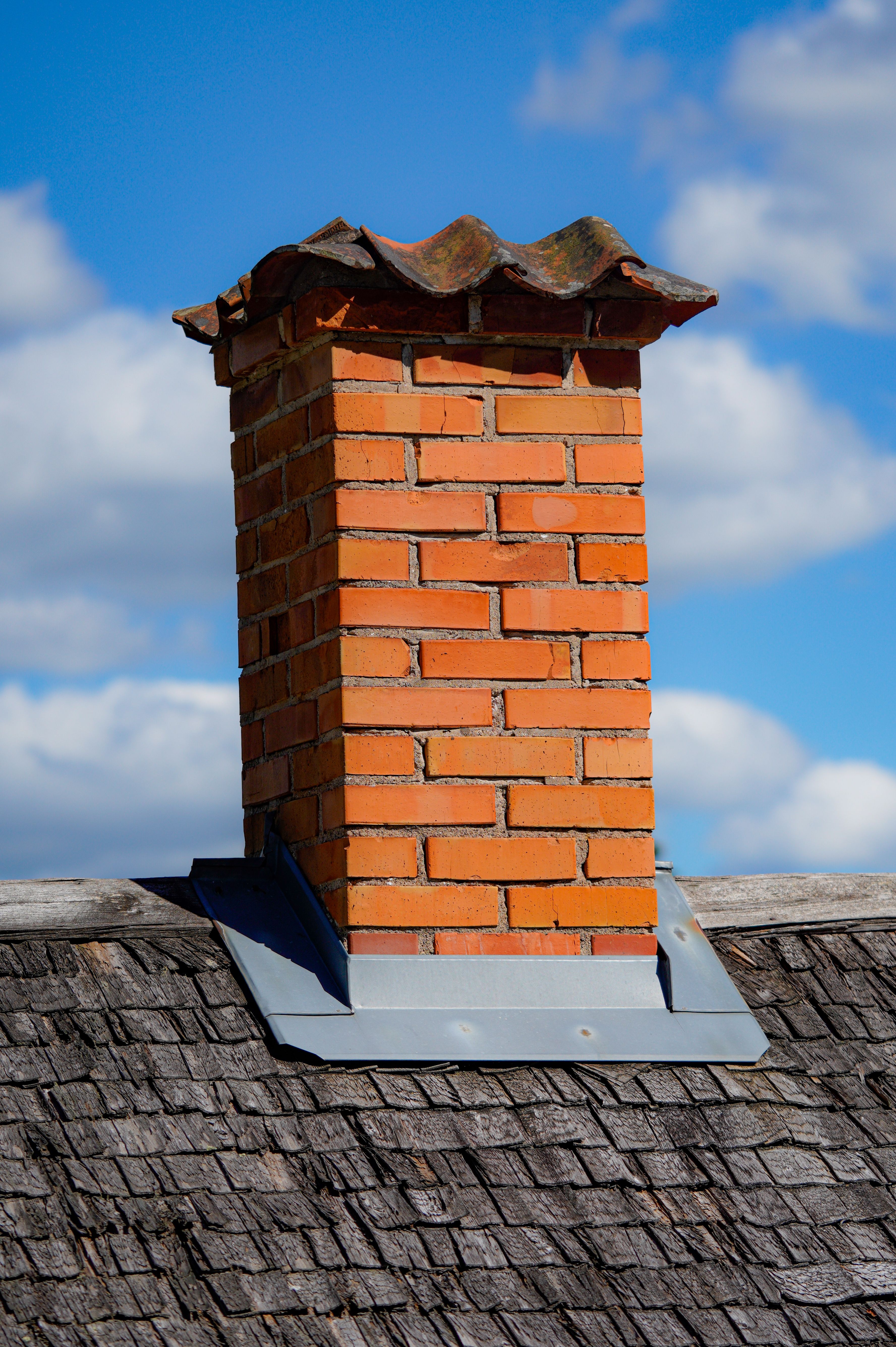 Chimney and pitched roof junction