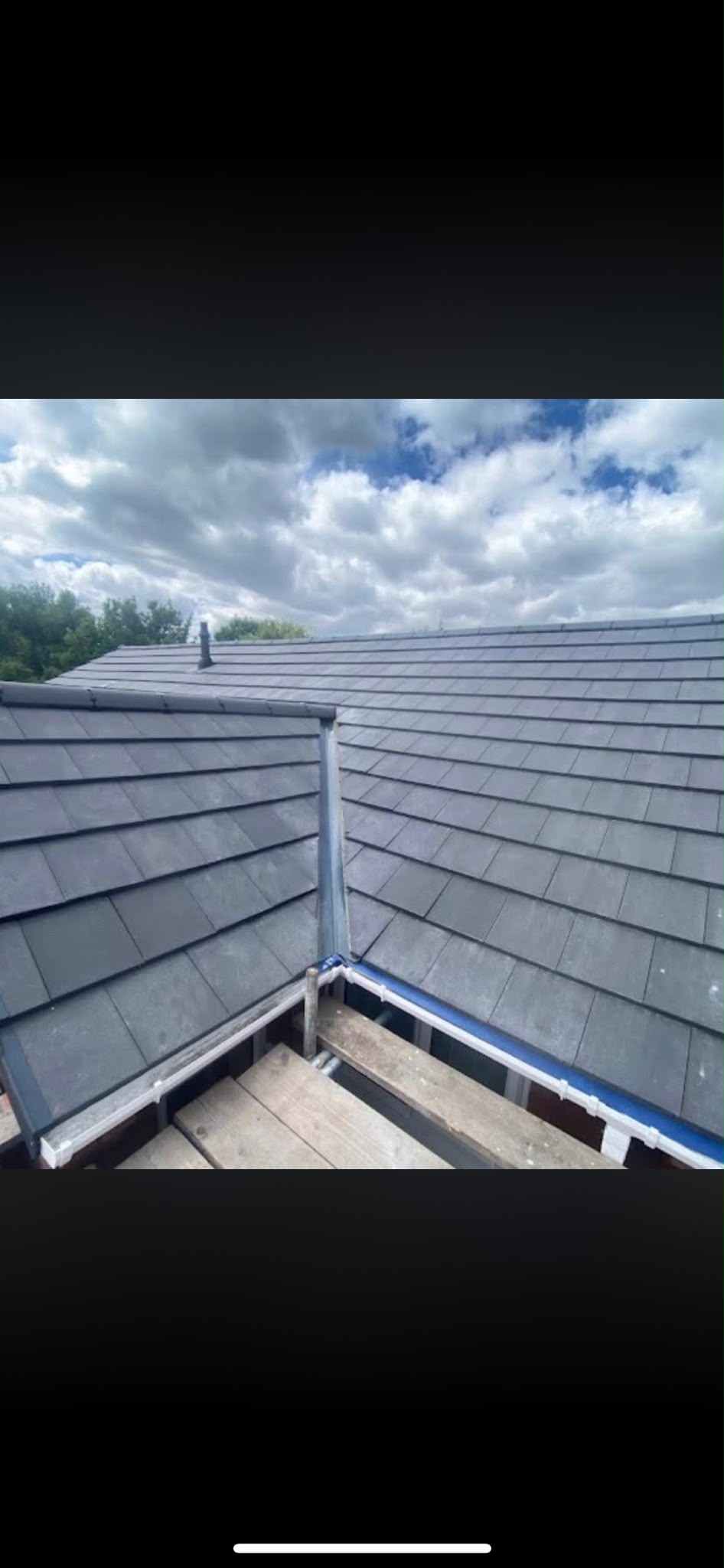 Slate pitched roofing installation