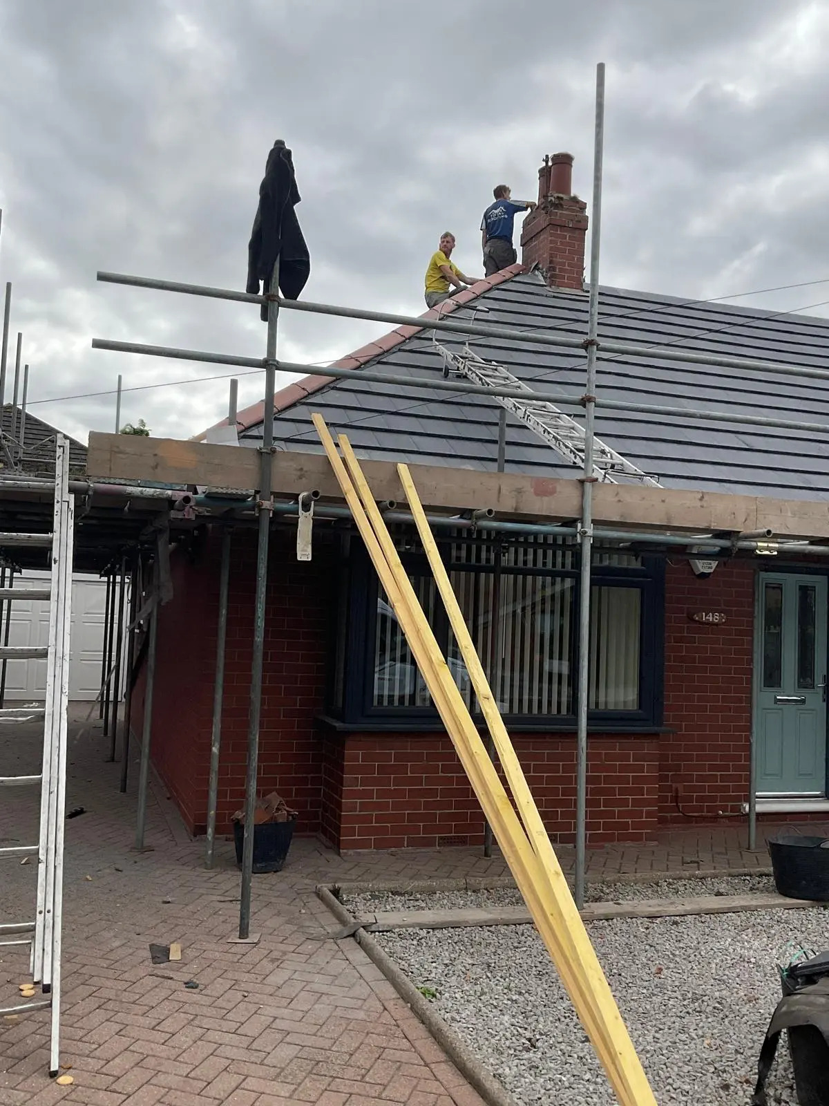 Pitched roofing work during a roofing project