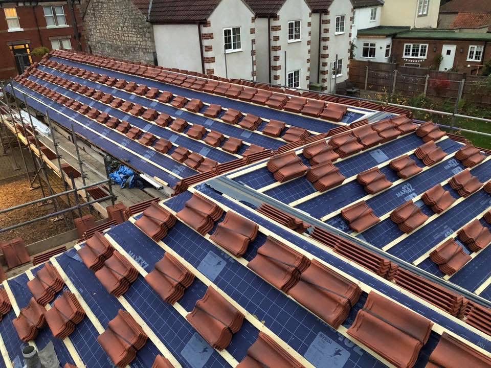 Existing roof showing recurring roofing problems and deterioration