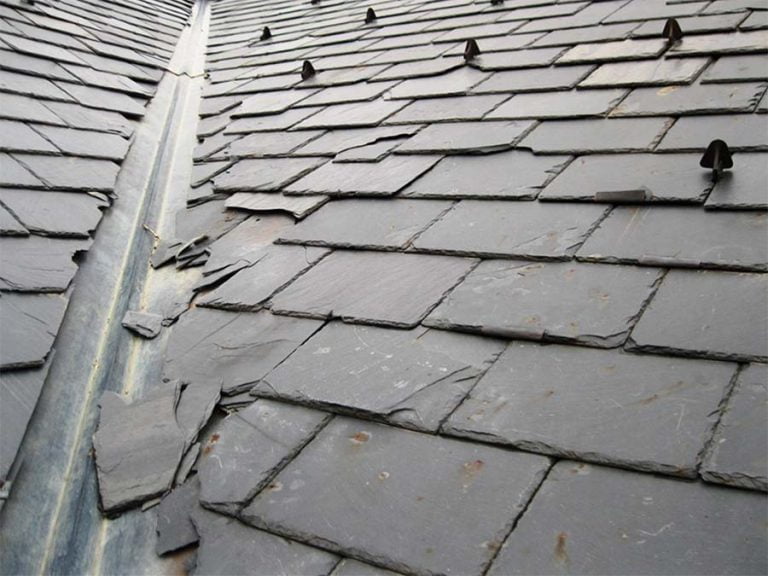 Extensive damaged roof tiles and slates requiring roofing work